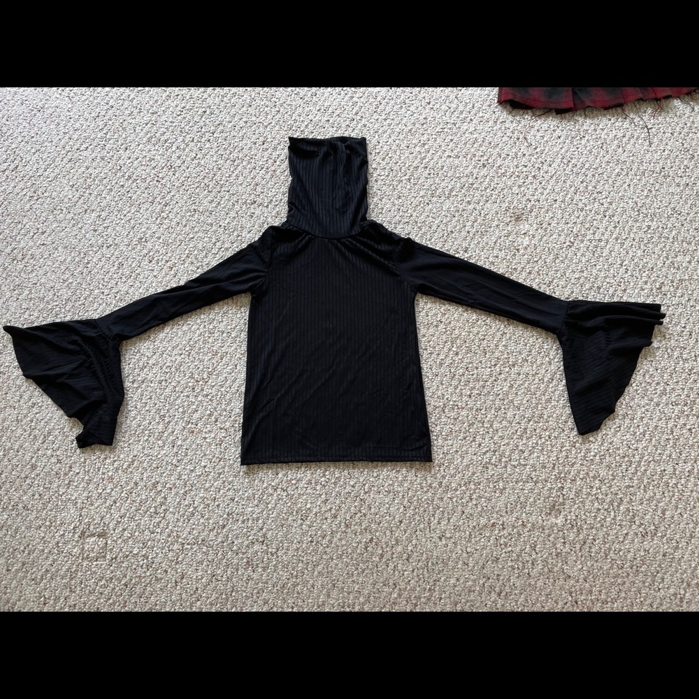 Black flare sleeved turtleneck
